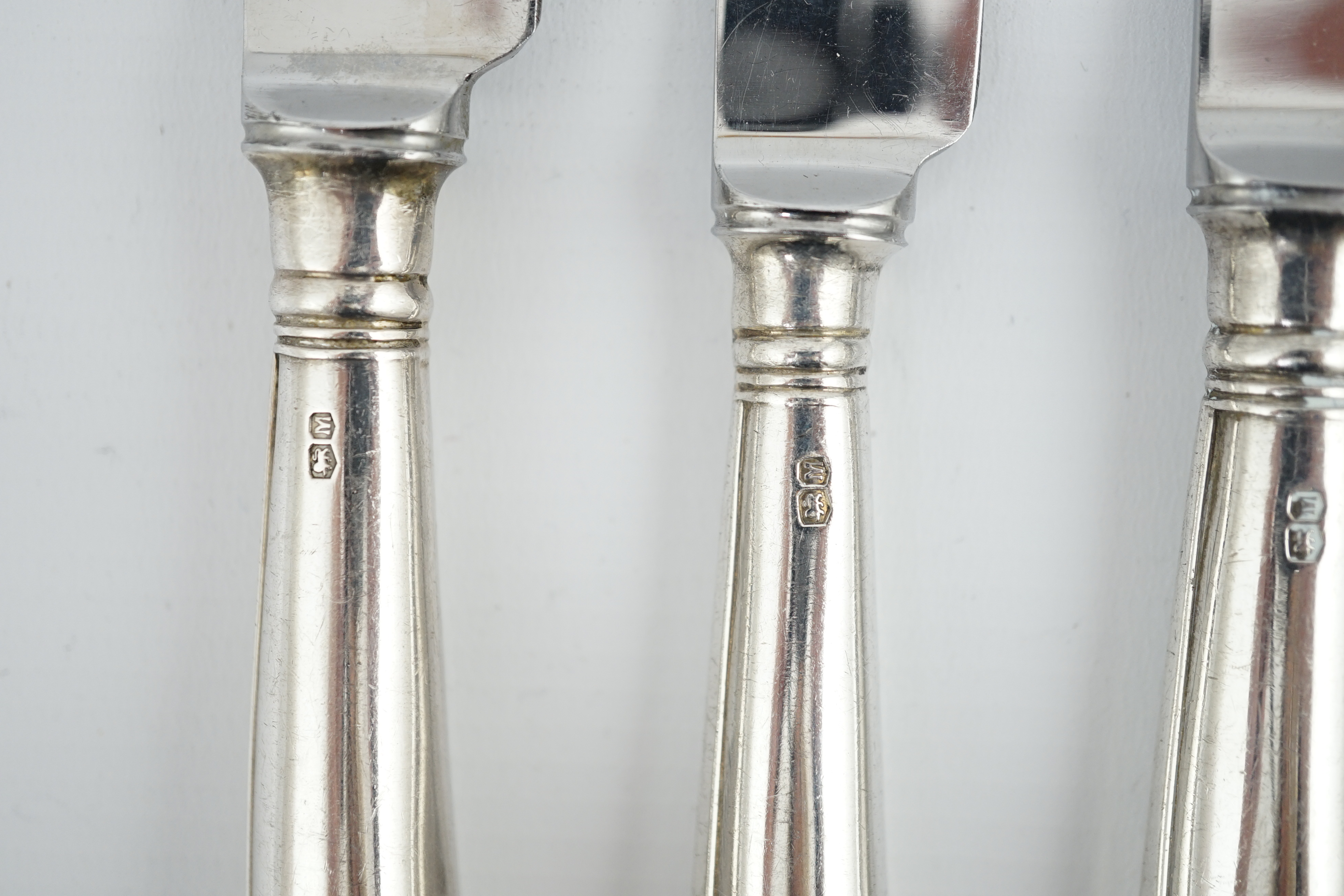 A set of six Elizabeth II silver handled table knives and six dessert knives, by George Howson